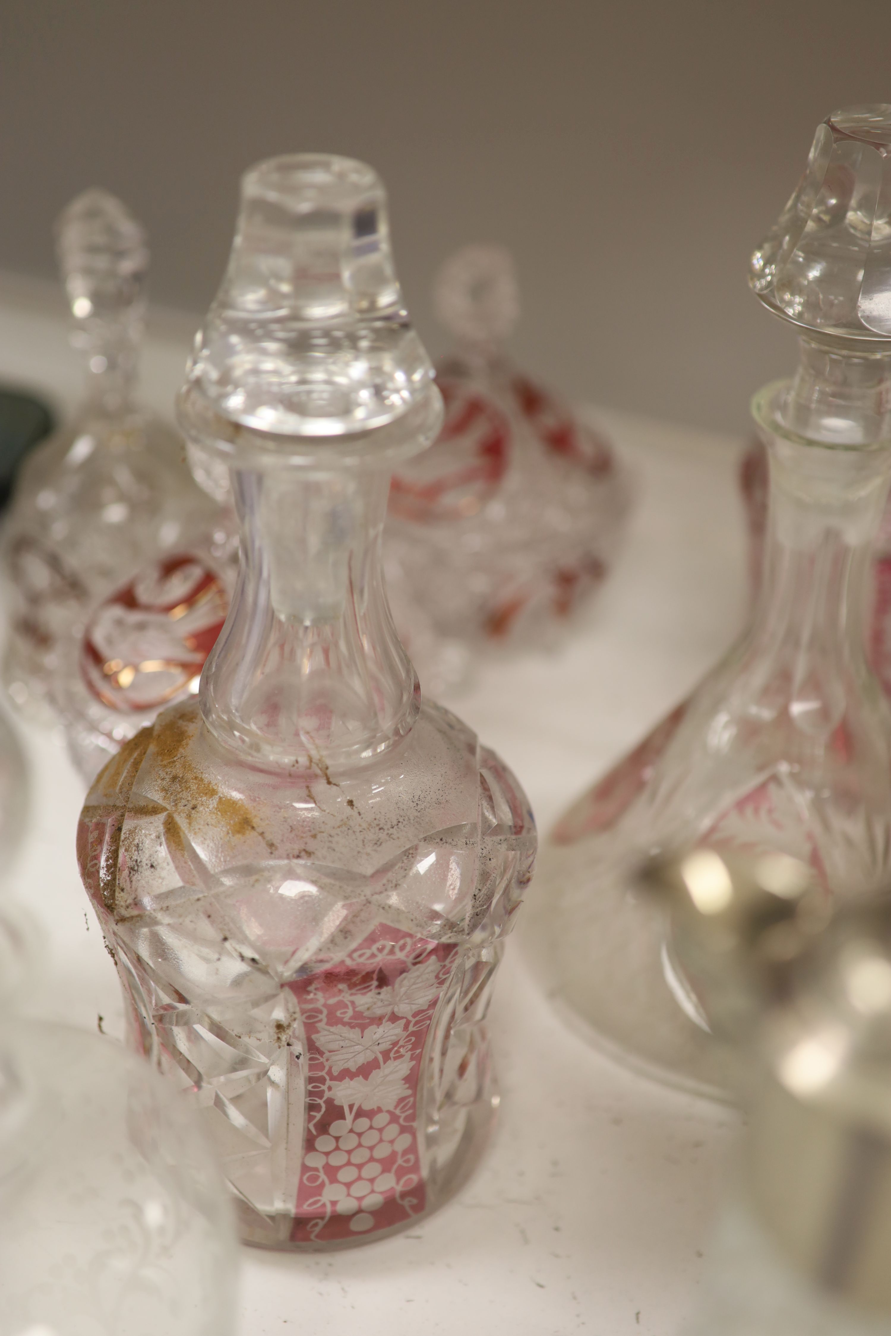 A quantity of mixed, cut, etched and overlaid glass, tallest 54cm